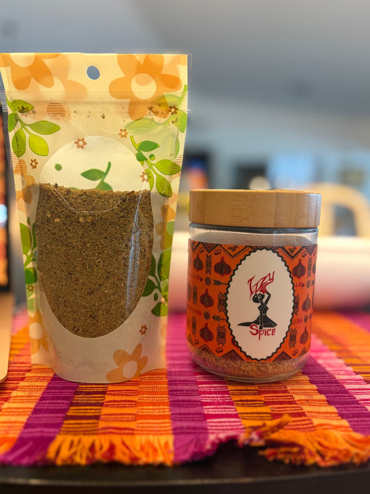 Izzyspice Dry Spice Blend 16 oz pouch beside the jar